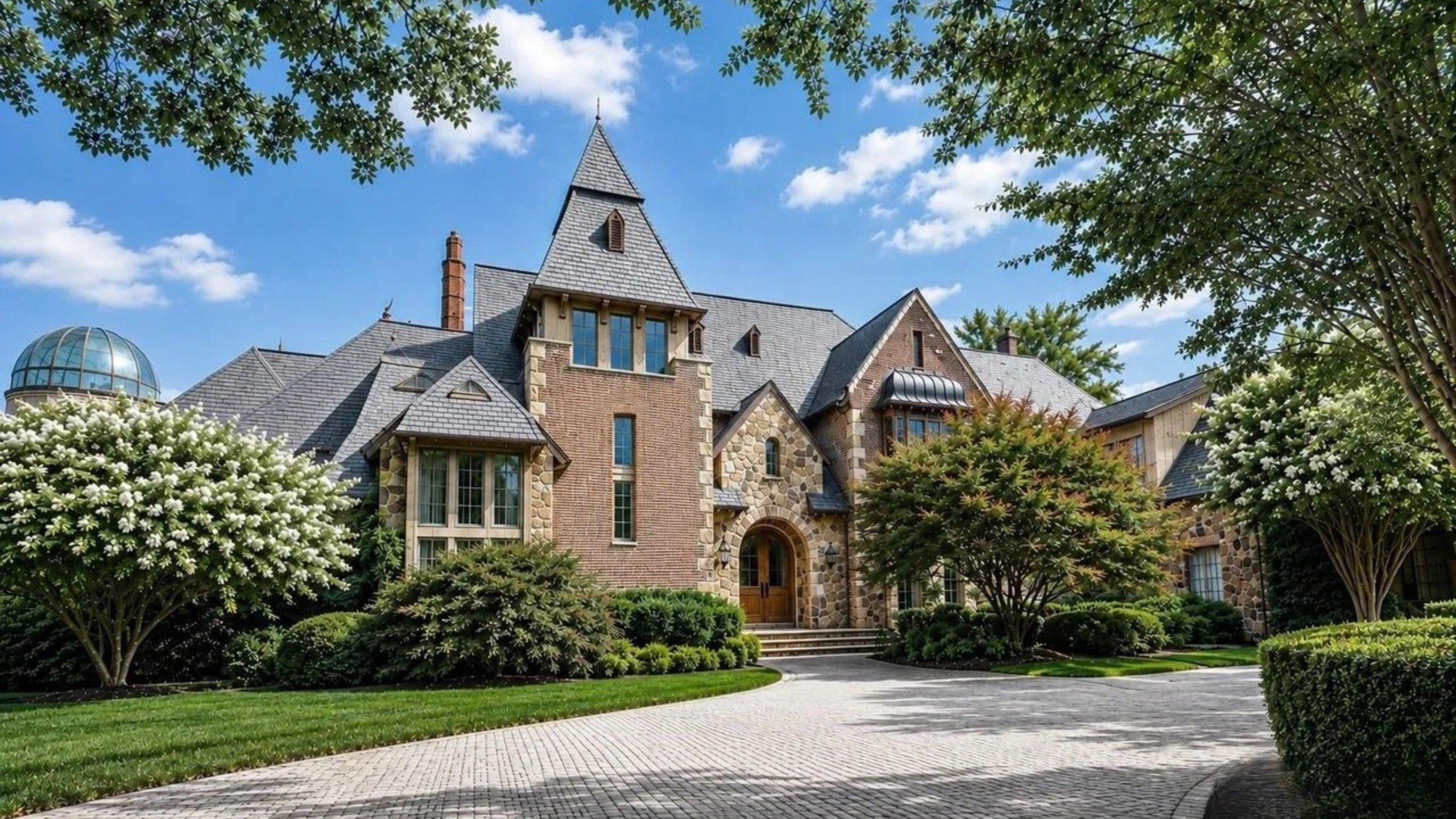 ‘Magnificent’ $7.2 Million Stone Manor With 2-Story Library Is Like Something Out of ‘Beauty and the Beast’