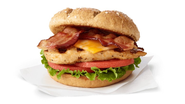 Chick-fil-A grilled chicken club sandwich in front of white background