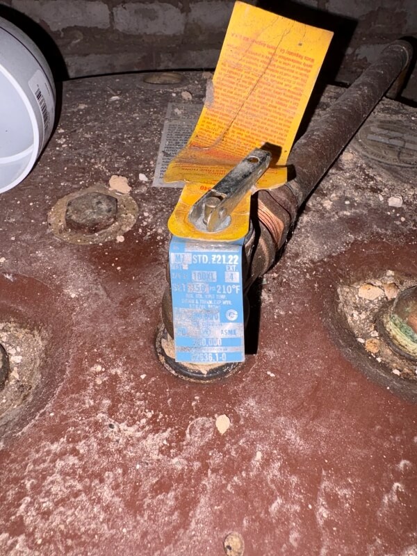 Homeowner asks how old a water heater is, and commenters say the tank is 'into the afterlife'