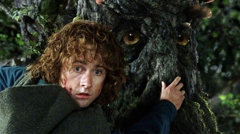 Pippin clinging to Treebeard in The Lord of the Rings