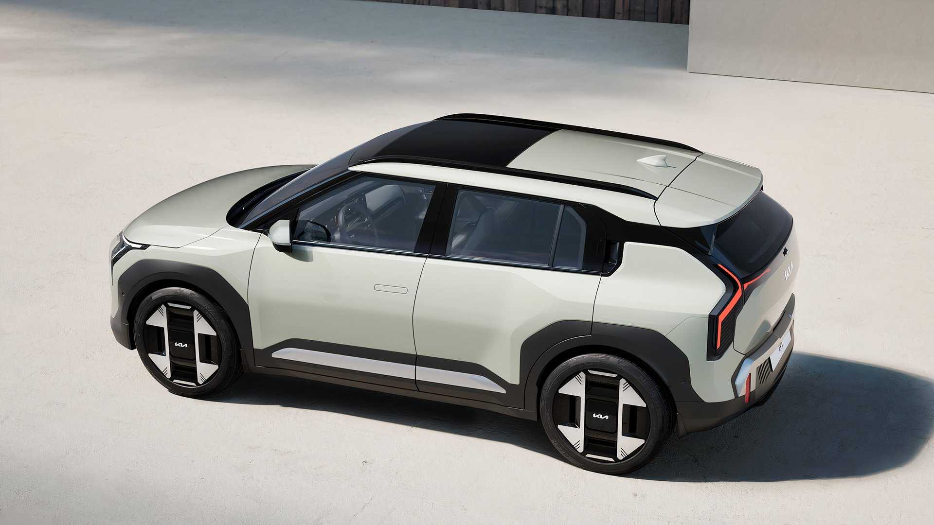 2025 Kia EV3 overhead rear 3/4 shot parked in studio