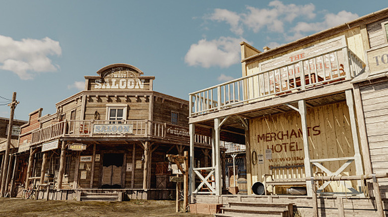 A photo of a 3D rendering of a town including a saloon and hotel in the wild west.