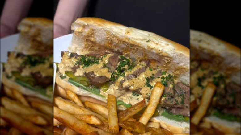 Brisket Sandwich with side of French fries from EZ Eatz by Yaya