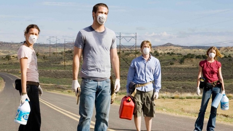 Bobby, Danny, Brian, and Kate standing outside with masks on