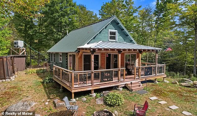The private island, located roughly 80 miles north of Bangor, features a four-bedroom, one-bathroom cabin that was completed in 2022
