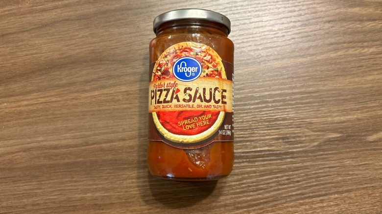 Kroger Parlor Style Pizza Sauce jar on wooden table