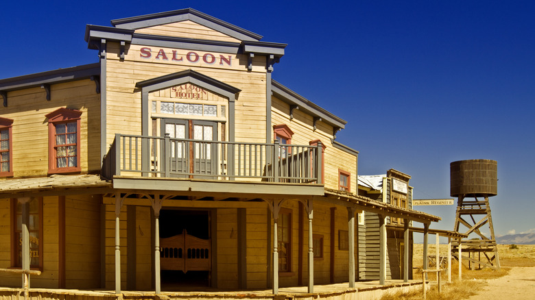 A rendering of an old west saloon and hotel.