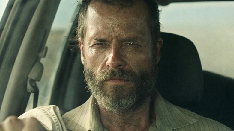 Eric looking intense driving in The Rover