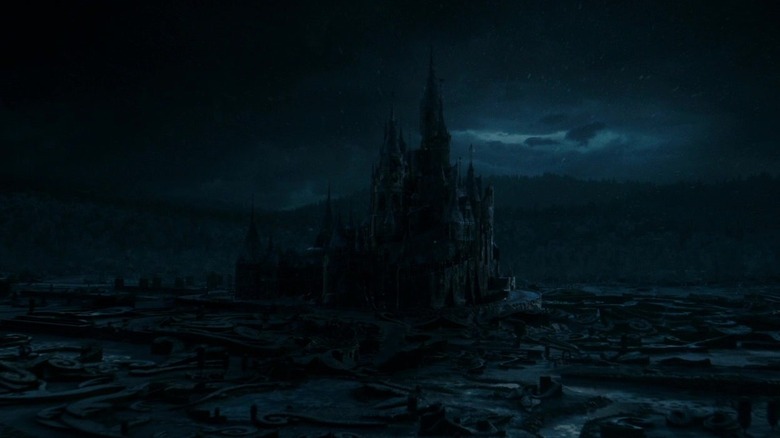 A dark wide shot of the Beast's Castle in Beauty and the Beast (2017)