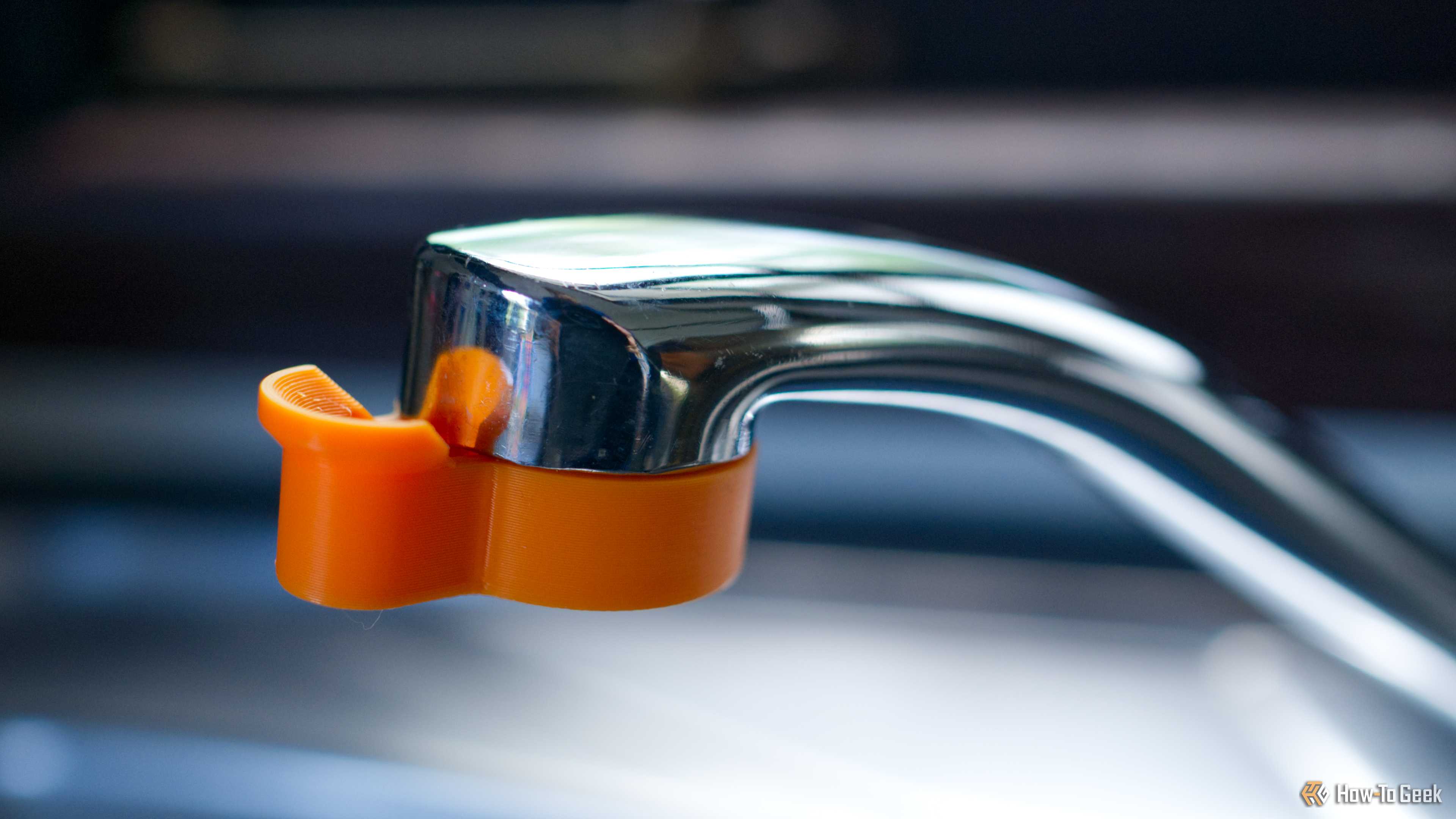Faucet descaler in orange.