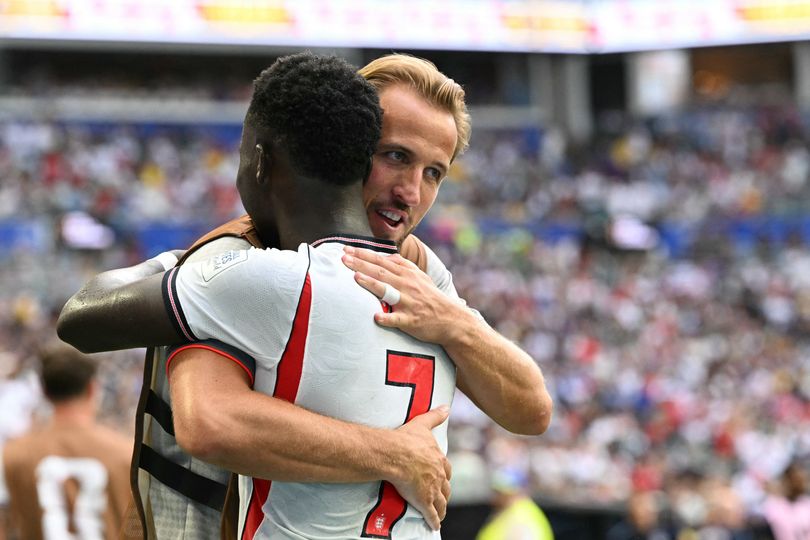 Kane ran over to celebrate with Bukayo Saka after his hat-trick