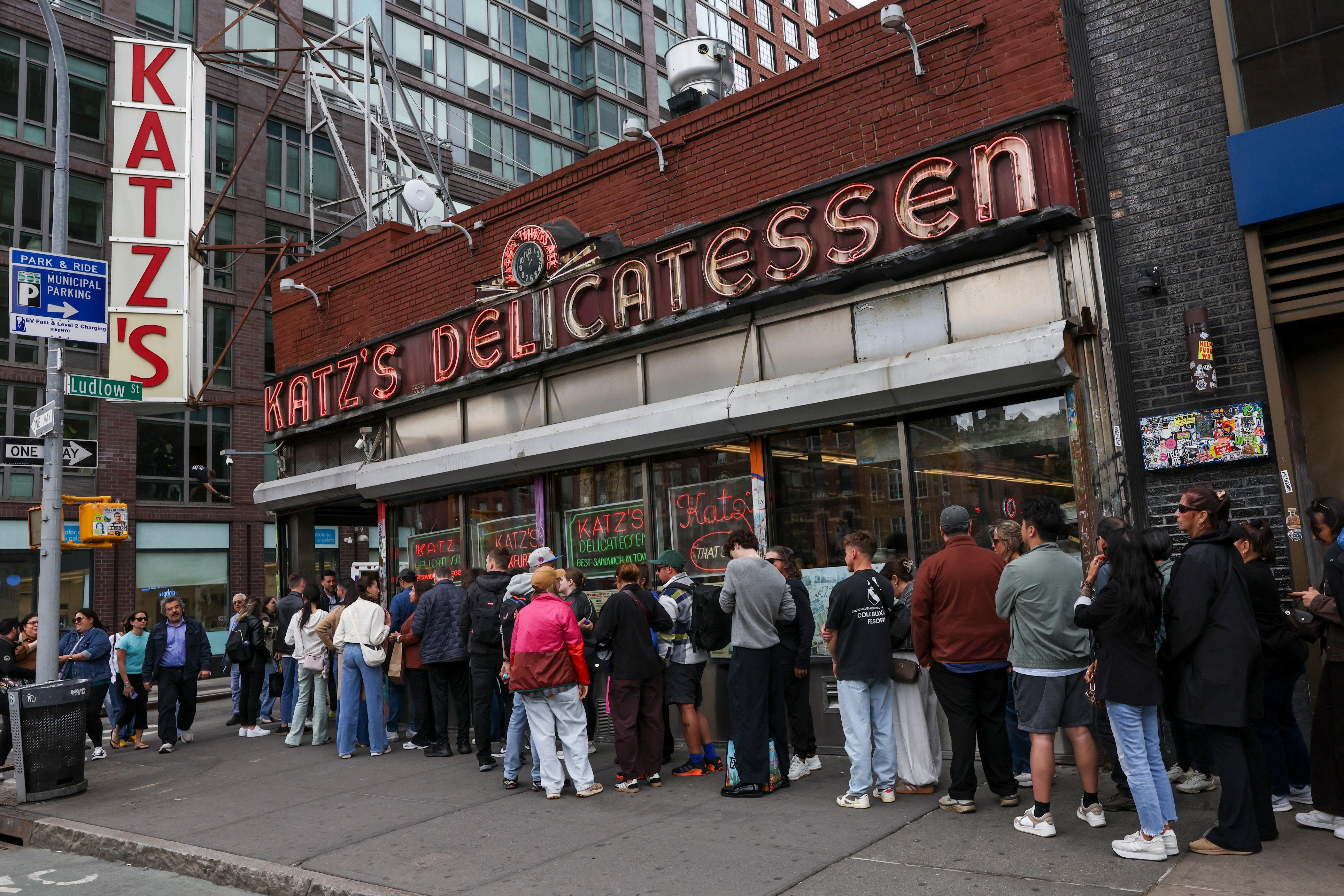 ‘The lines are a New York contradiction: islands of waiting in a city that traditionally doesn’t wait for anything’ (AFP/Getty)