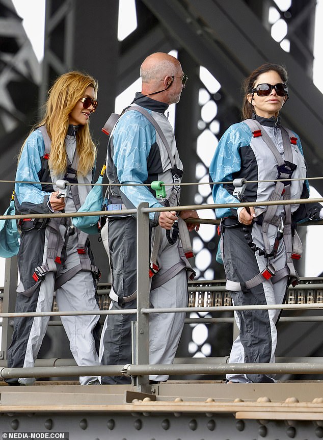 The Bezoses (right) were part of a group of five doing the climb
