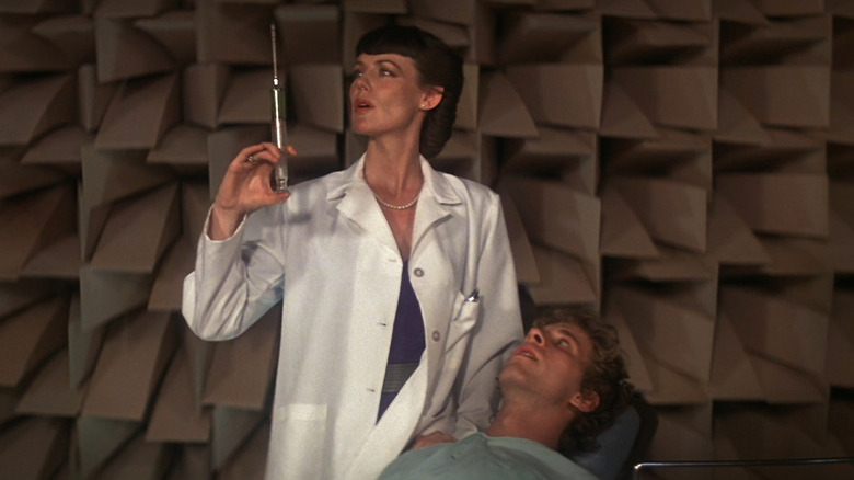Gwen Parkinson preparing to drug Pete