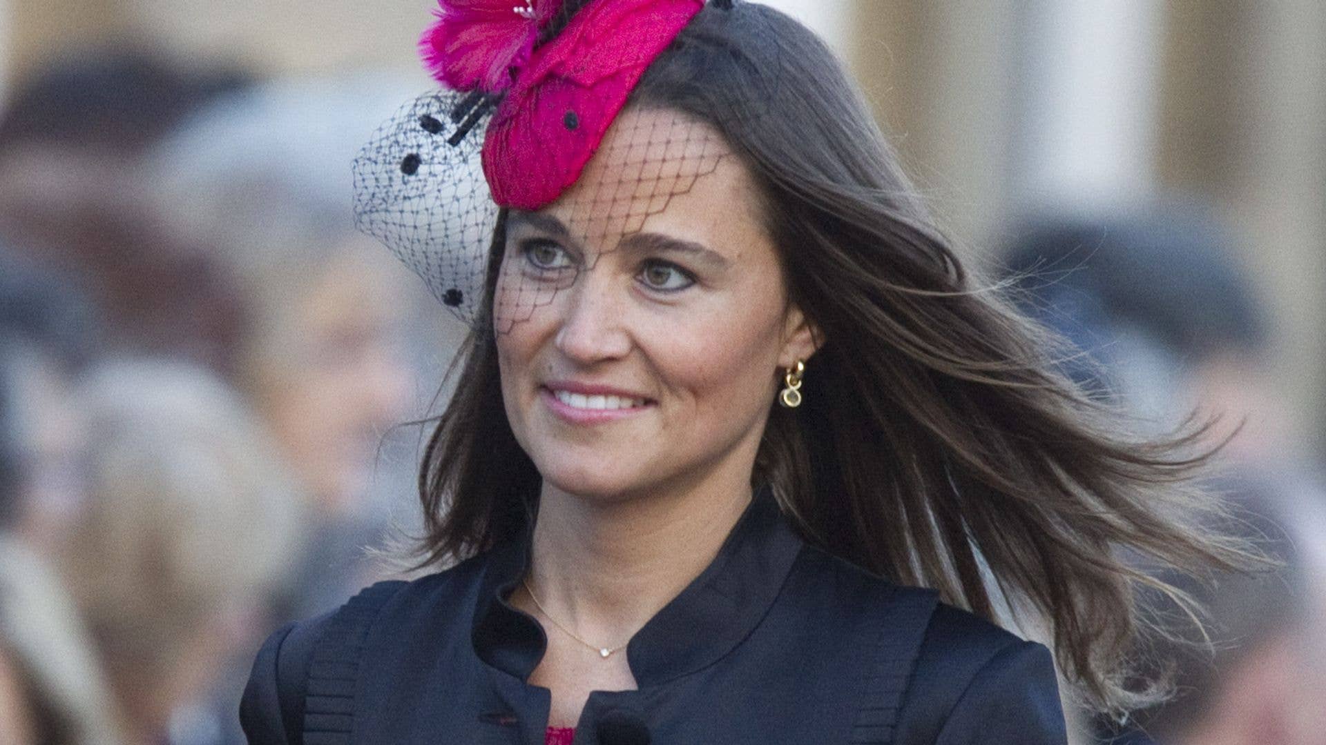 Pippa Middleton displays long legs in flouncy mini wedding guest dress