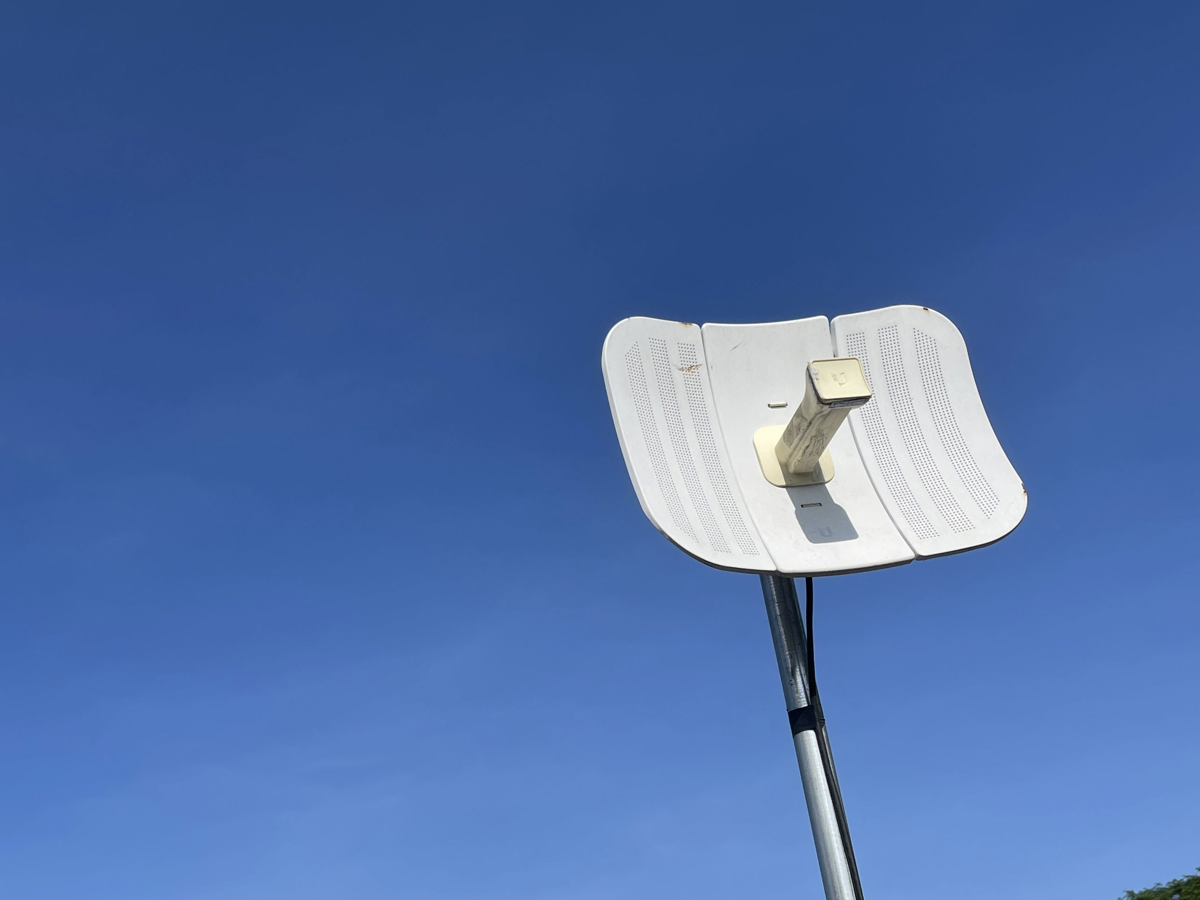 Your mesh wi-fi can't reach your backyard—here's what actually will