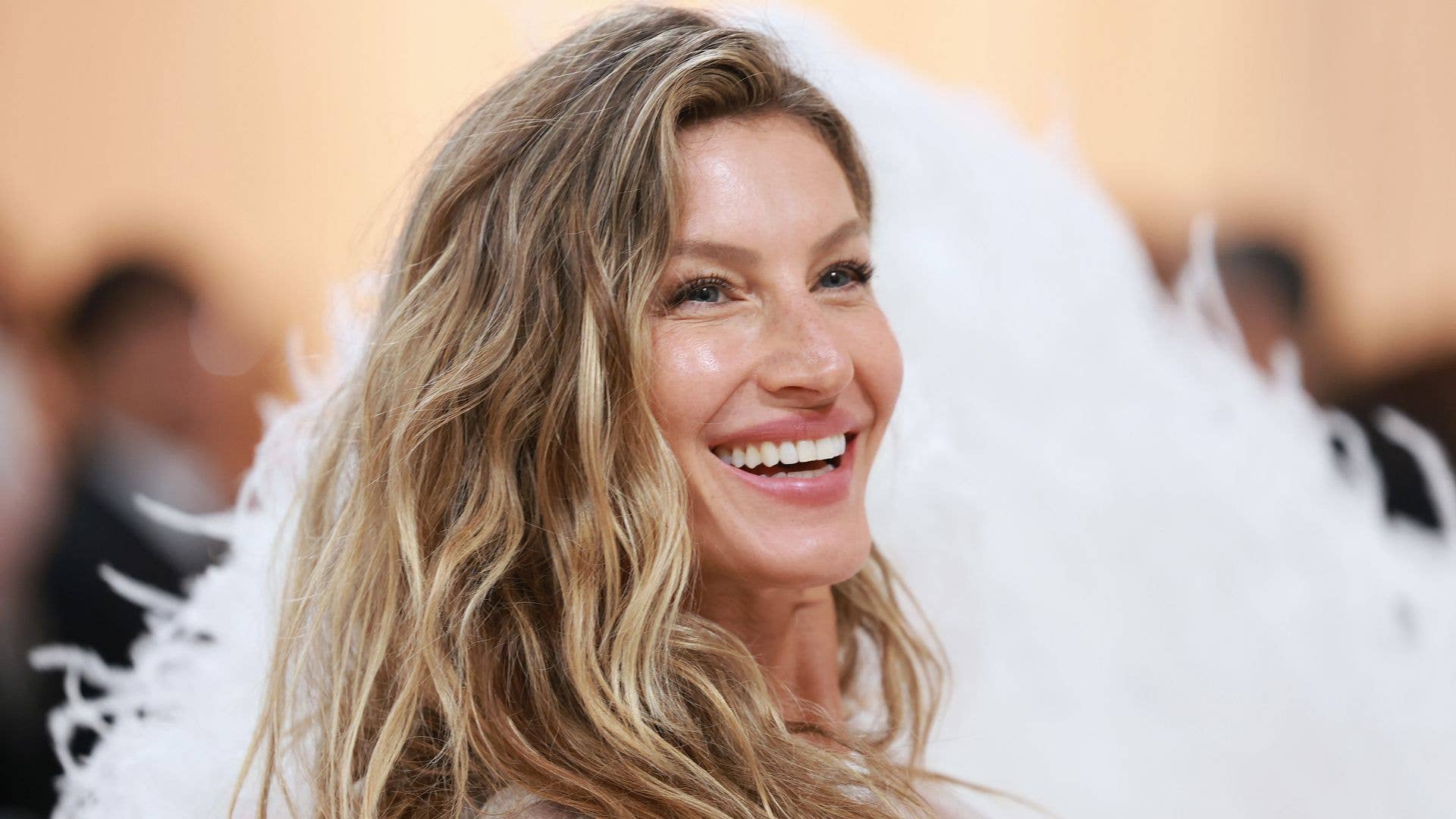 Bikini-clad Gisele Bündchen looks tanned and toned while lounging in the sun for 46th birthday