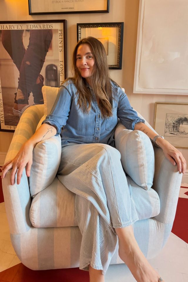 Drew Barrymore posts a photo of herself sitting in a new chair she designed