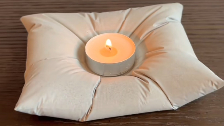 DIY cement pillow that could be used for candles or storage
