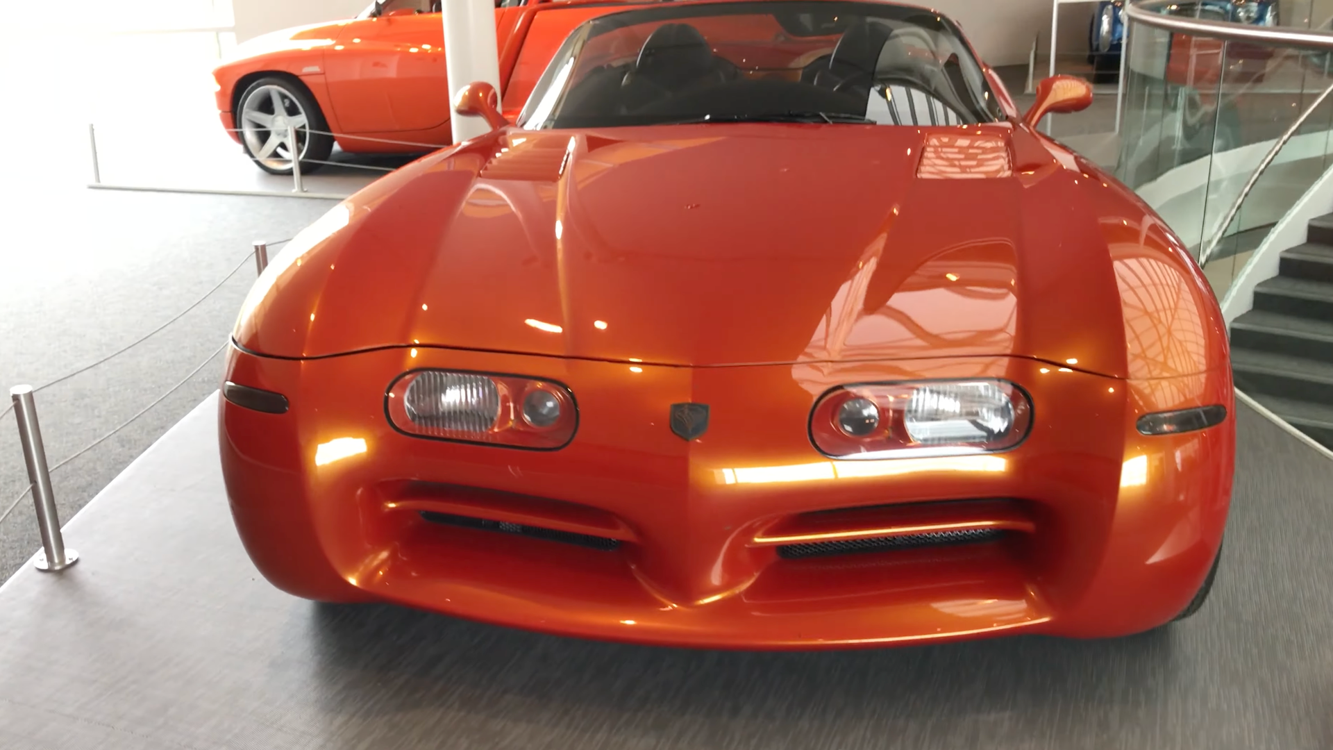 The grille of an orange dodge concept roadster car