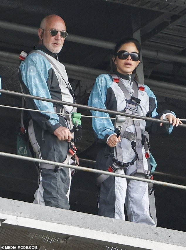 The Bezoses (above) touched down in Sydney on Friday afternoon