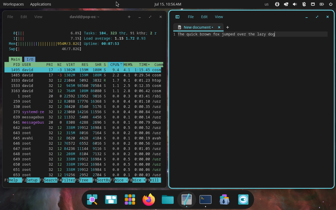 COSMIC terminal running htop tiled side-by-side with the editor on Pop!_OS.