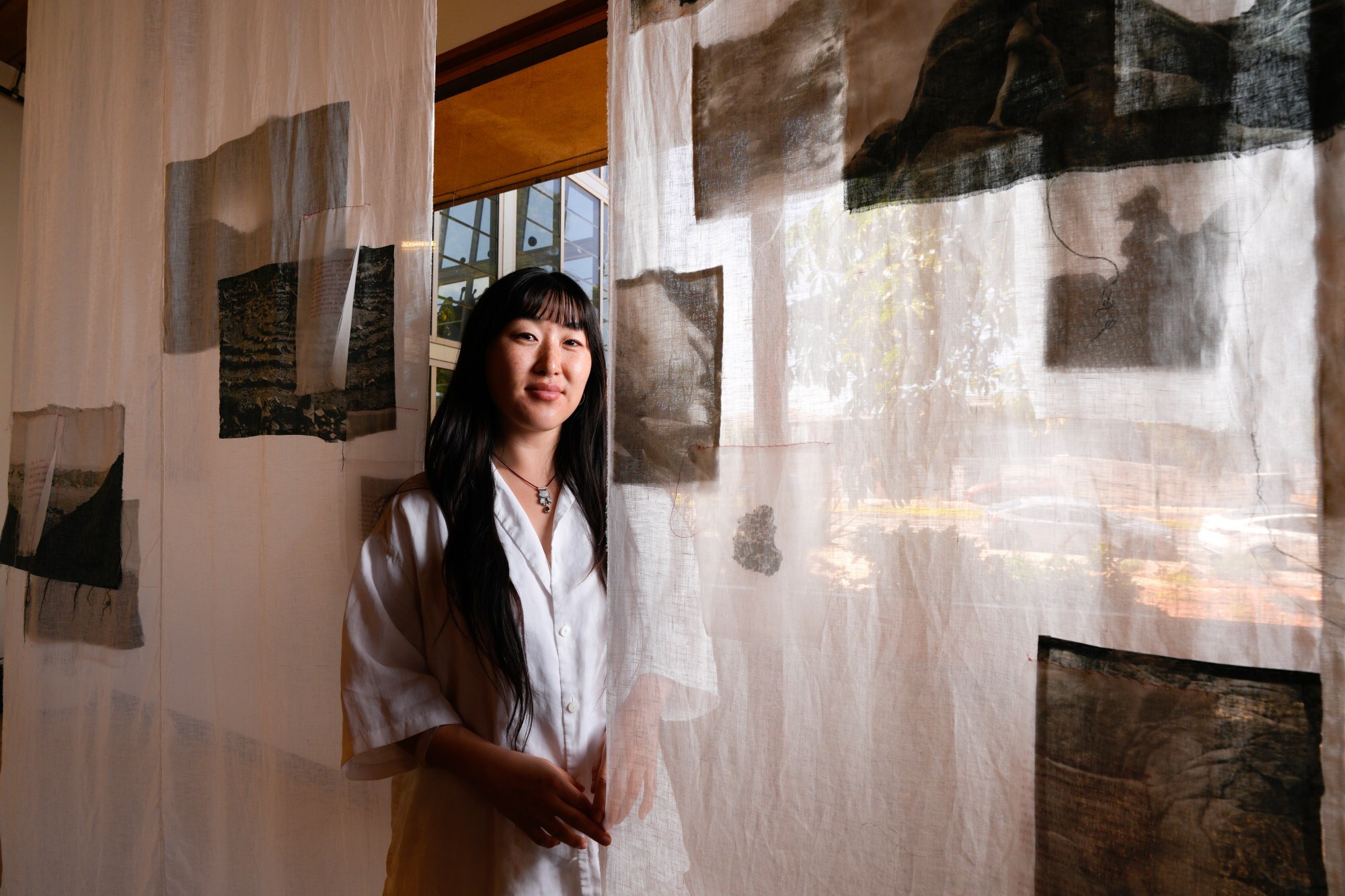 Lucy Mu Li is presenting her photographic textile installation at the A Reason to Survive art exhibit in National City, CA. Lucy Mu Li is a visual artist and a fellow with the San Diego AAPI Emerging Artist Fellowship, whose work is included in the exhibition EROTECH: Expanded Erotics for Reclaiming Aliveness”, on display through Aug. 7 at A Reason to Survive in National City.