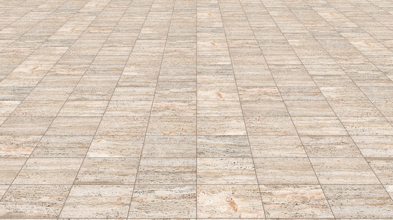 Paving made with travertine stone blocks