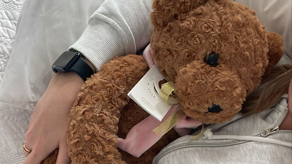 Jade received a teddy bear from her cousin, which was the same length and weight as Felicity was at birth
