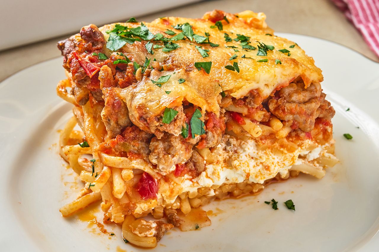 A slice of milliondollar spaghetti on a plate