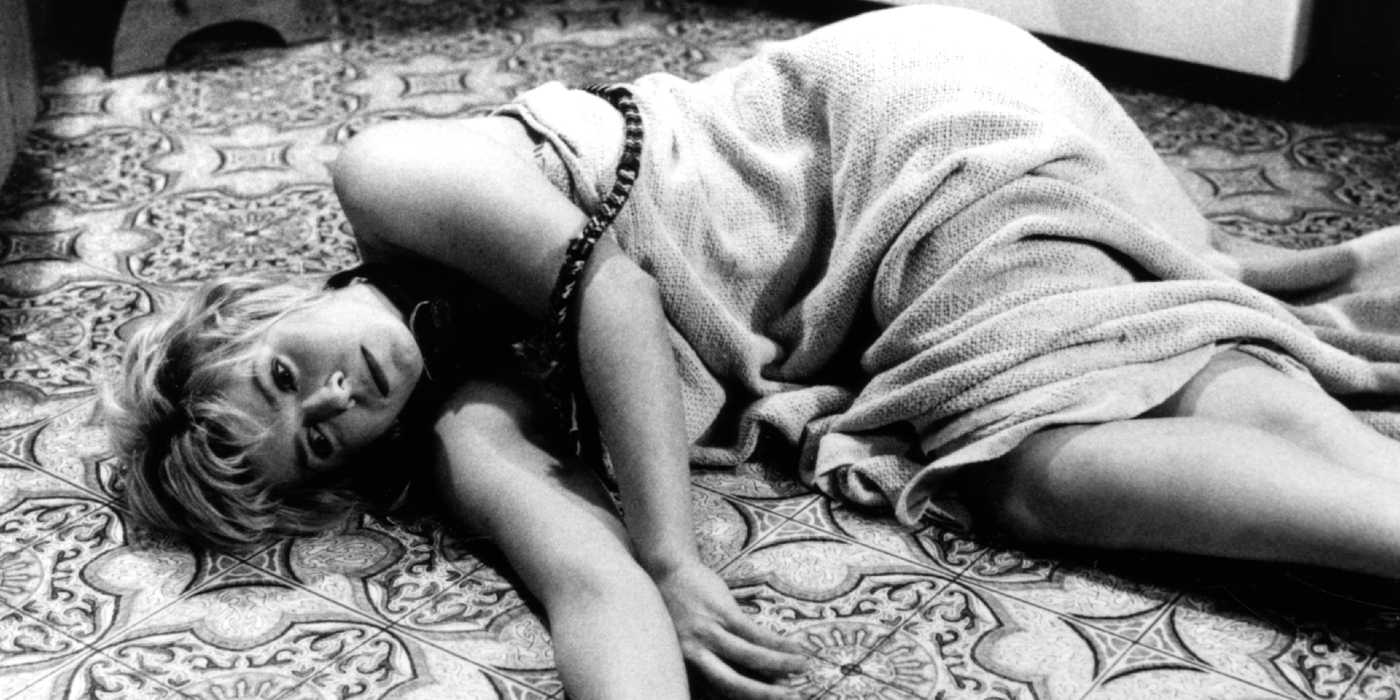 A woman lies on the floor in Friday the 13th: The Series