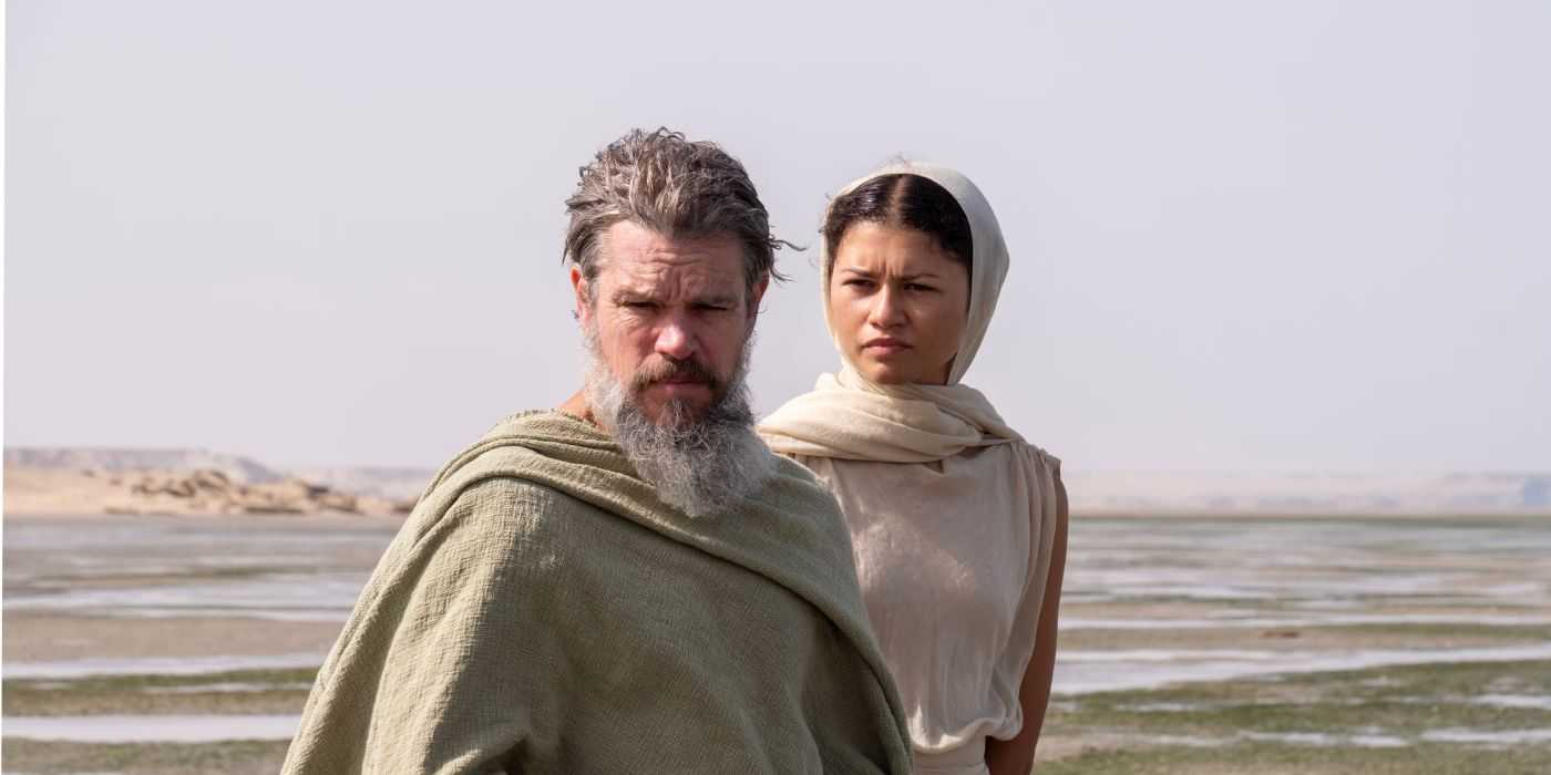 A bearded Odysseus stands in front of the Goddess Athena