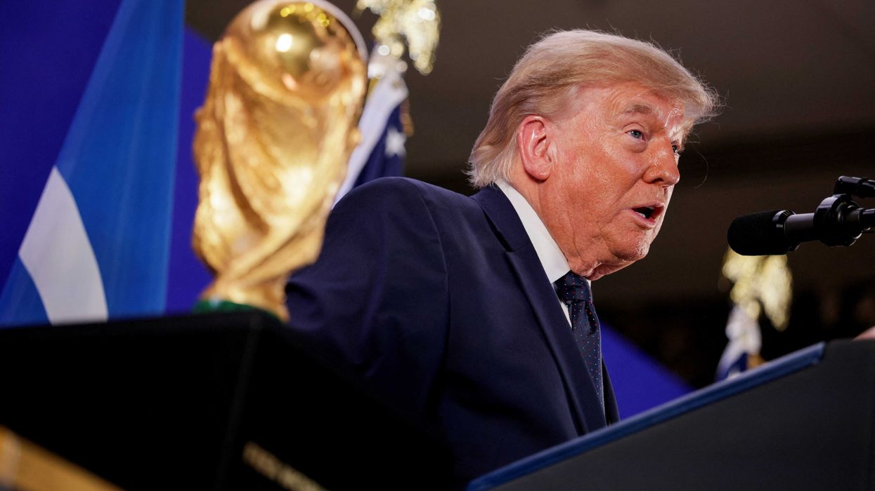 U.S. President Donald Trump speaks while standing next to the FIFA World Cup Trophy, during a FIFA reception at Trump Tower in New York City, U.S., July 17, 2026. REUTERS/Evan Vucci