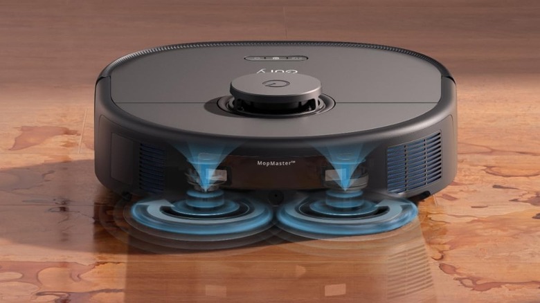 Eufy X10 Pro Omni cleaning water on a wooden floor