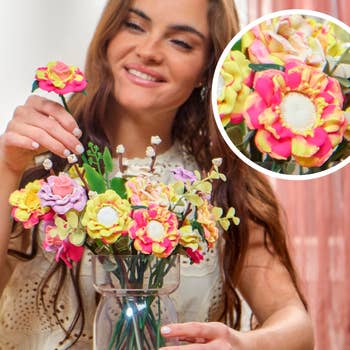 Woman arranging a vase of colorful artificial flowers with a close-up inset showing flower details, suggesting a focus on home decor shopping