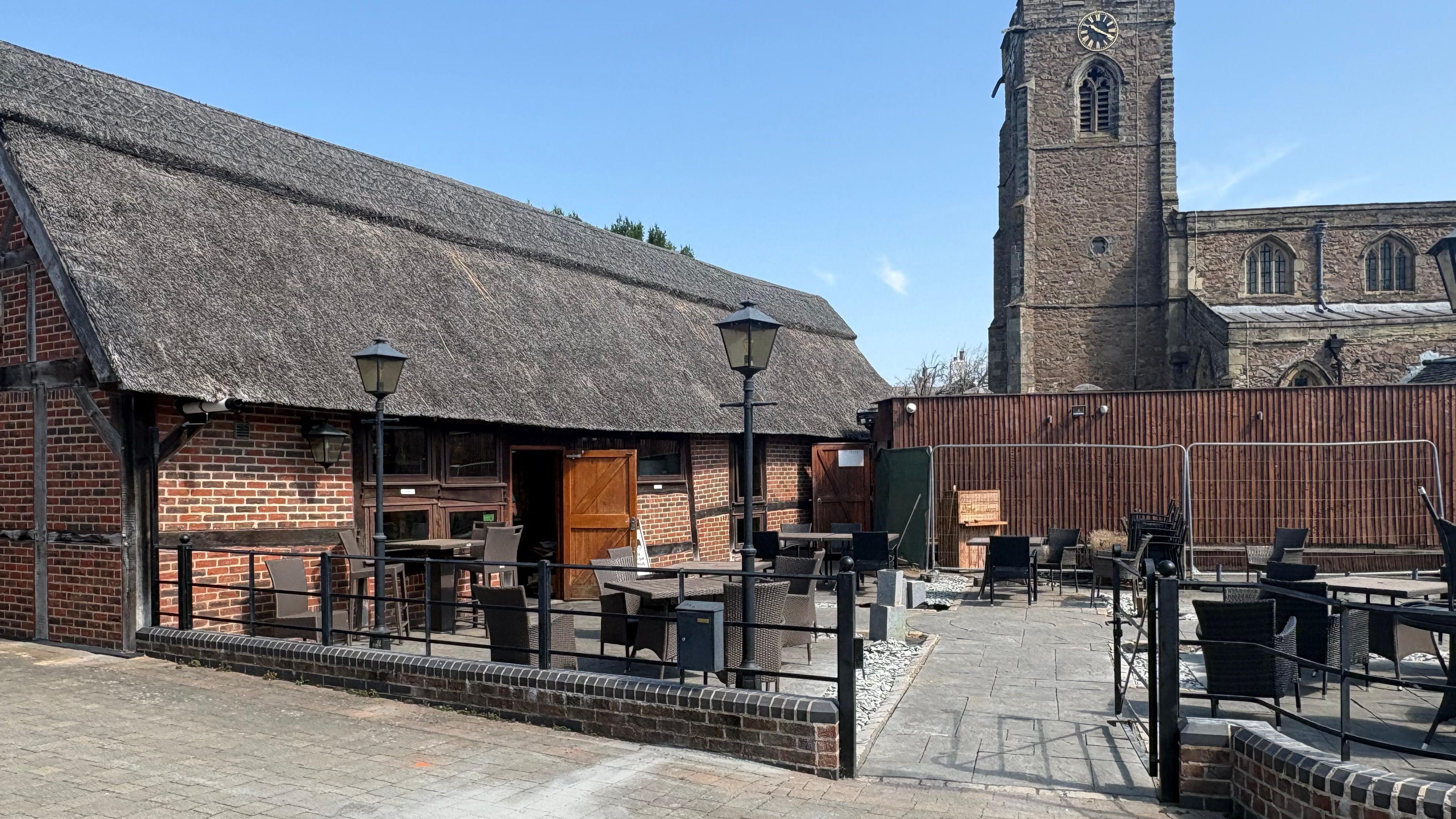 Cafe reopens after fire destroyed outbuilding