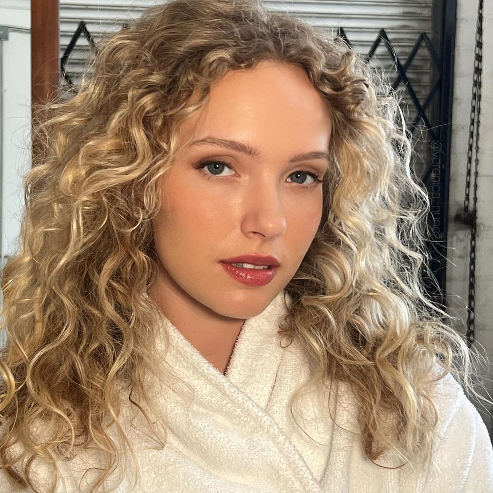long curly blonde hair