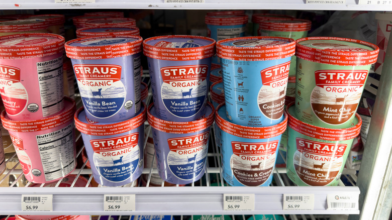 Various ice cream flavors of Straus Family Creamery in a shop fridge.
