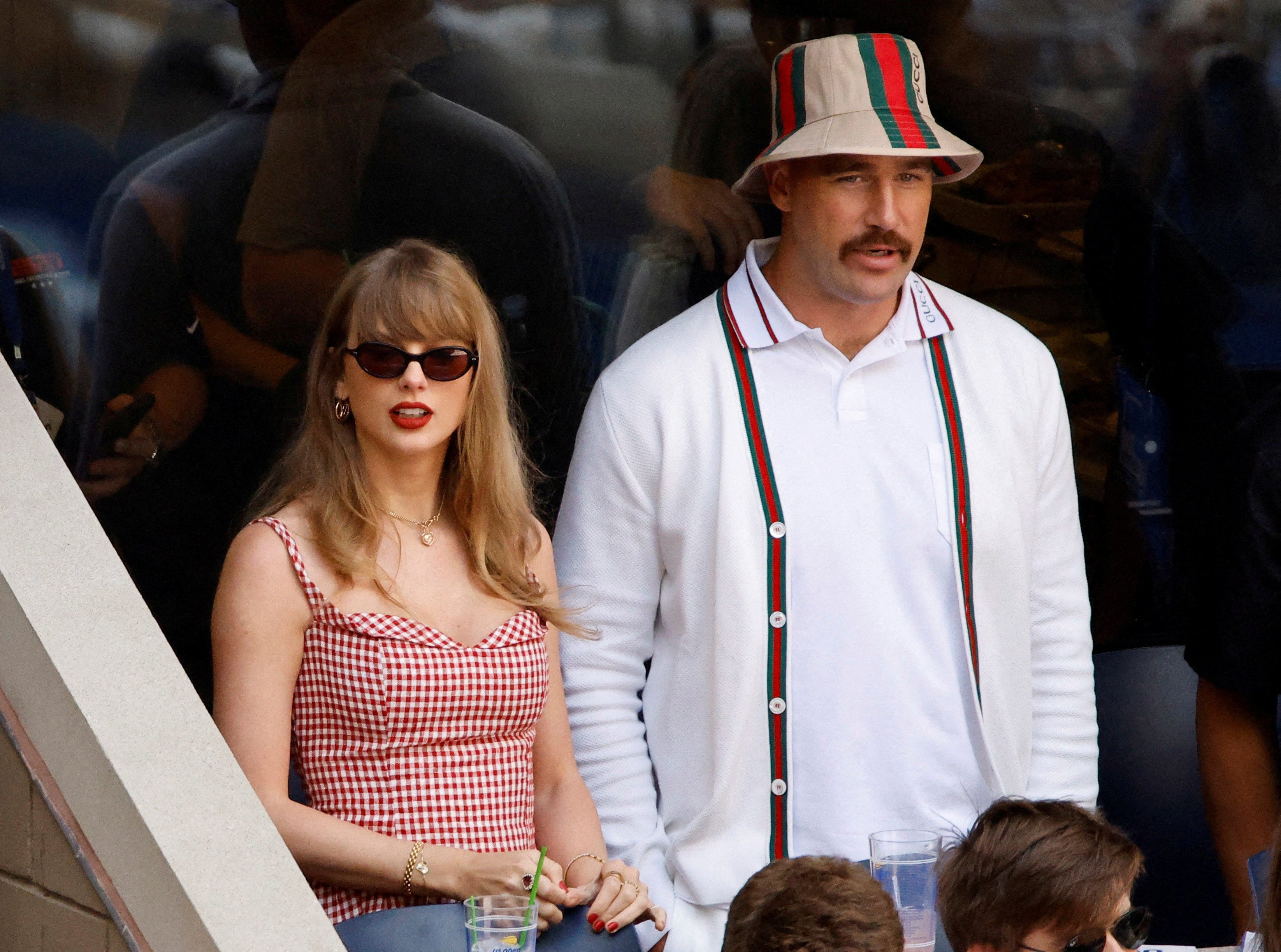 FILE PHOTO: Tennis - U.S. Open - Flushing Meadows, New York, United States - September 8, 2024 Singer Taylor Swift and Kansas City Chiefs' Travis Kelce are seen during the final match between Italy's Jannik Sinner and Taylor Fritz of the U.S. REUTERS/Eduardo Munoz/File Photo