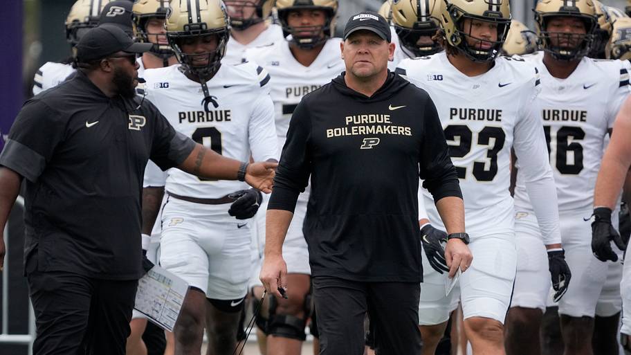Purdue Boilermakers head coach Barry Odom takes the field.
