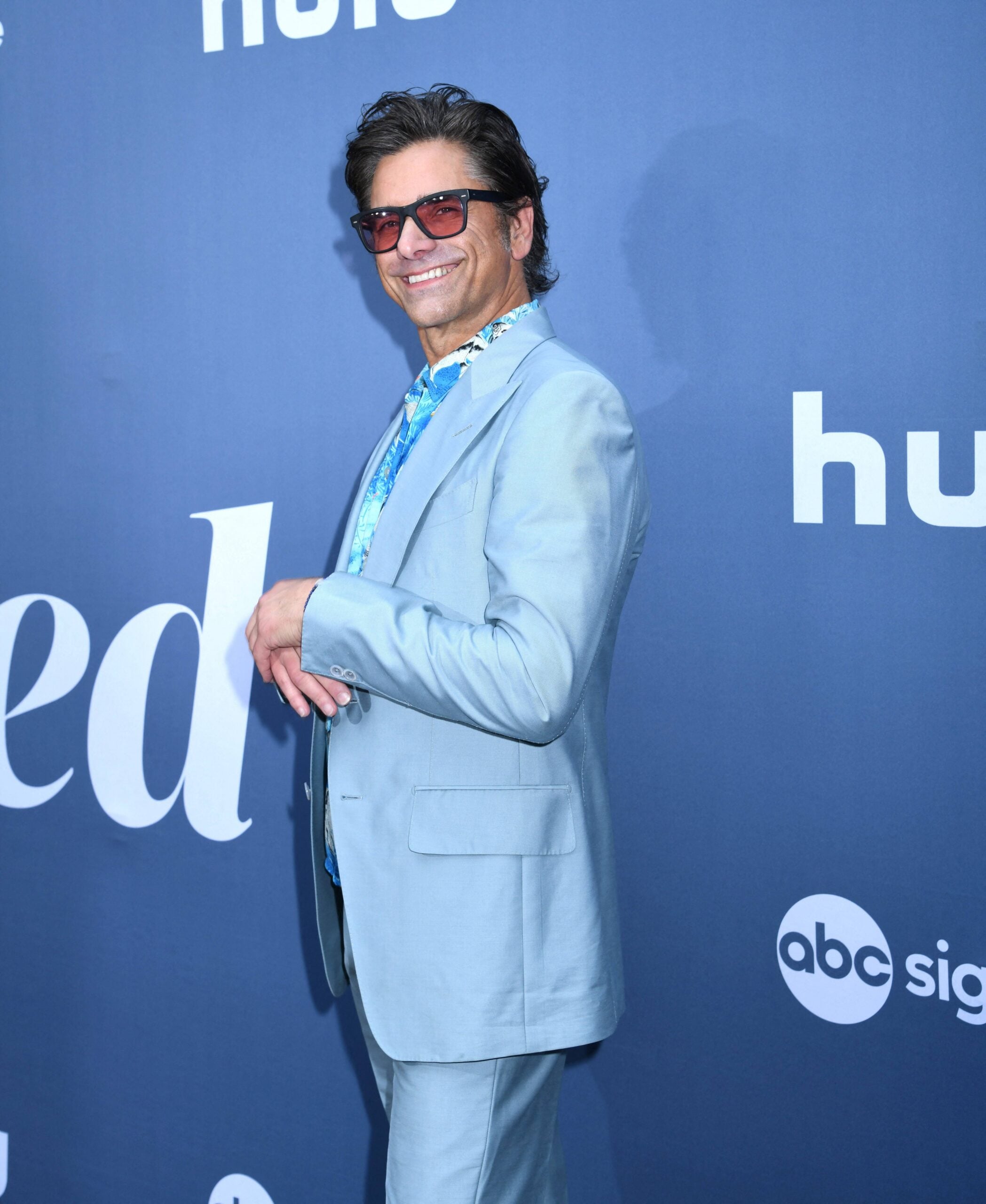 John Stamos is all smiles at premiere for UnPrisoned