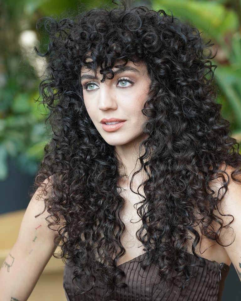 long curly hair with bangs