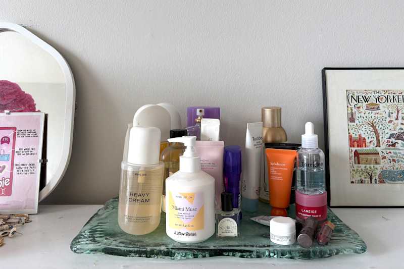 Toiletries organized on dresser.