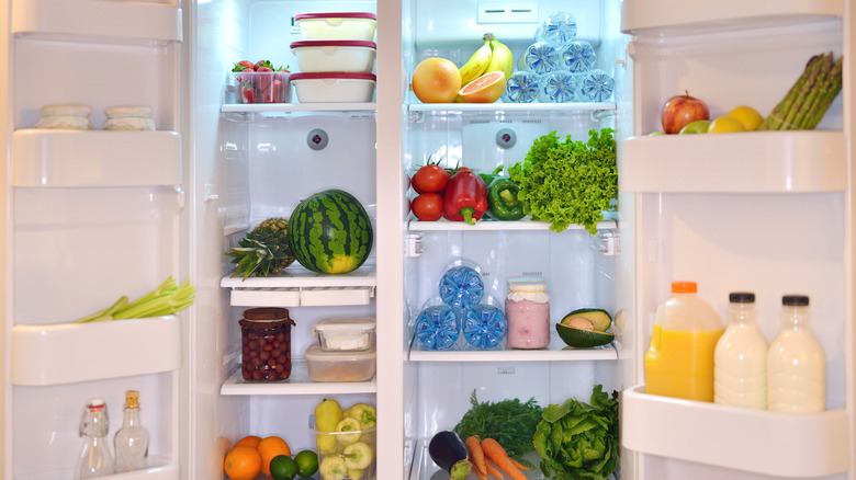 Well-organized side-by-side refrigerator with both doors open