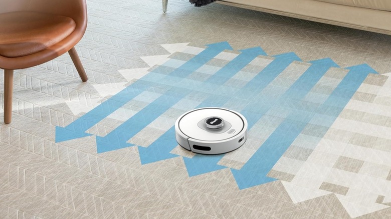 The Shark Matrix Clean's cleaning action represented by arrows
