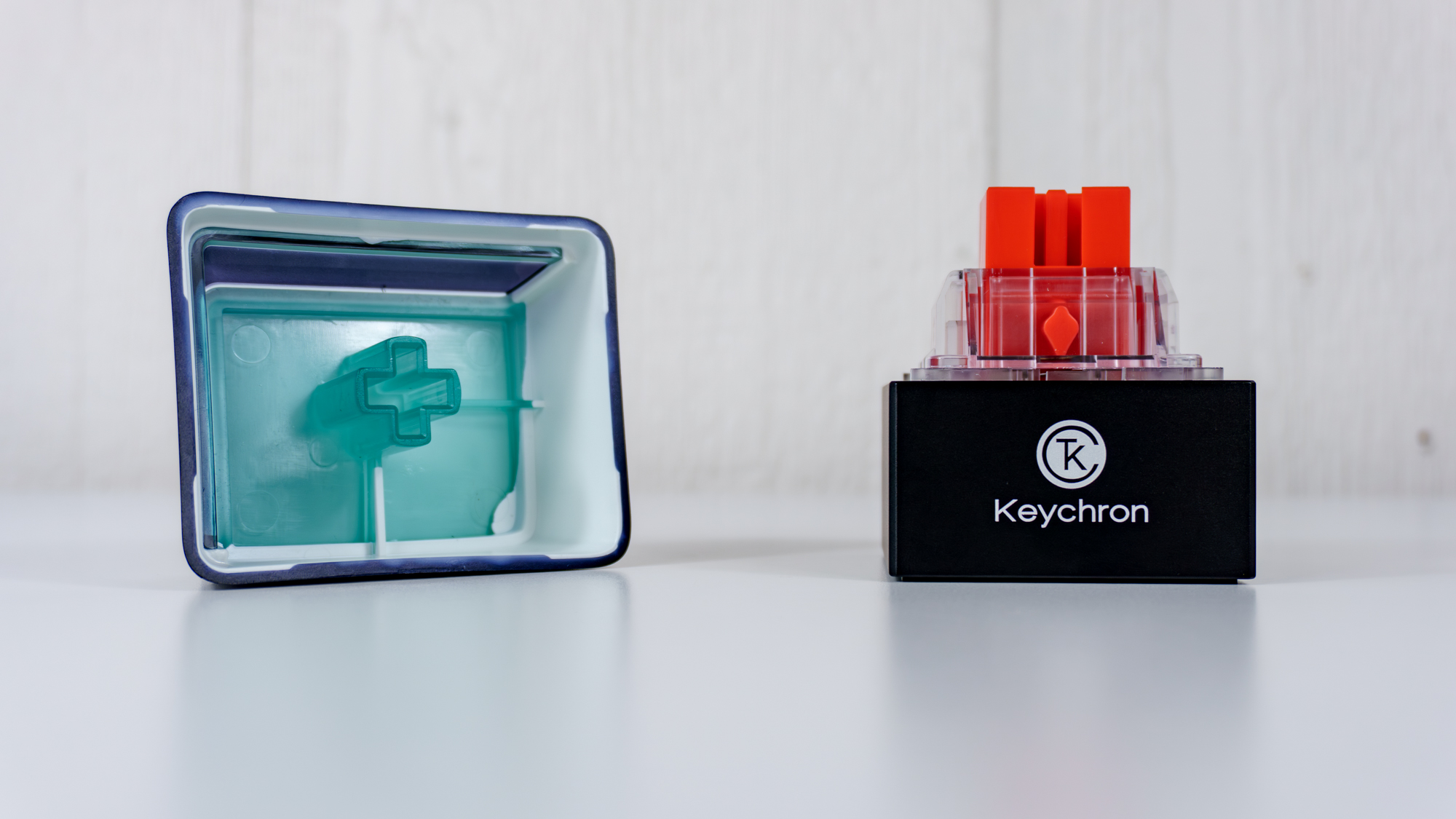 The Keychron Q0 Mini 8K Action Key with its keycap removed