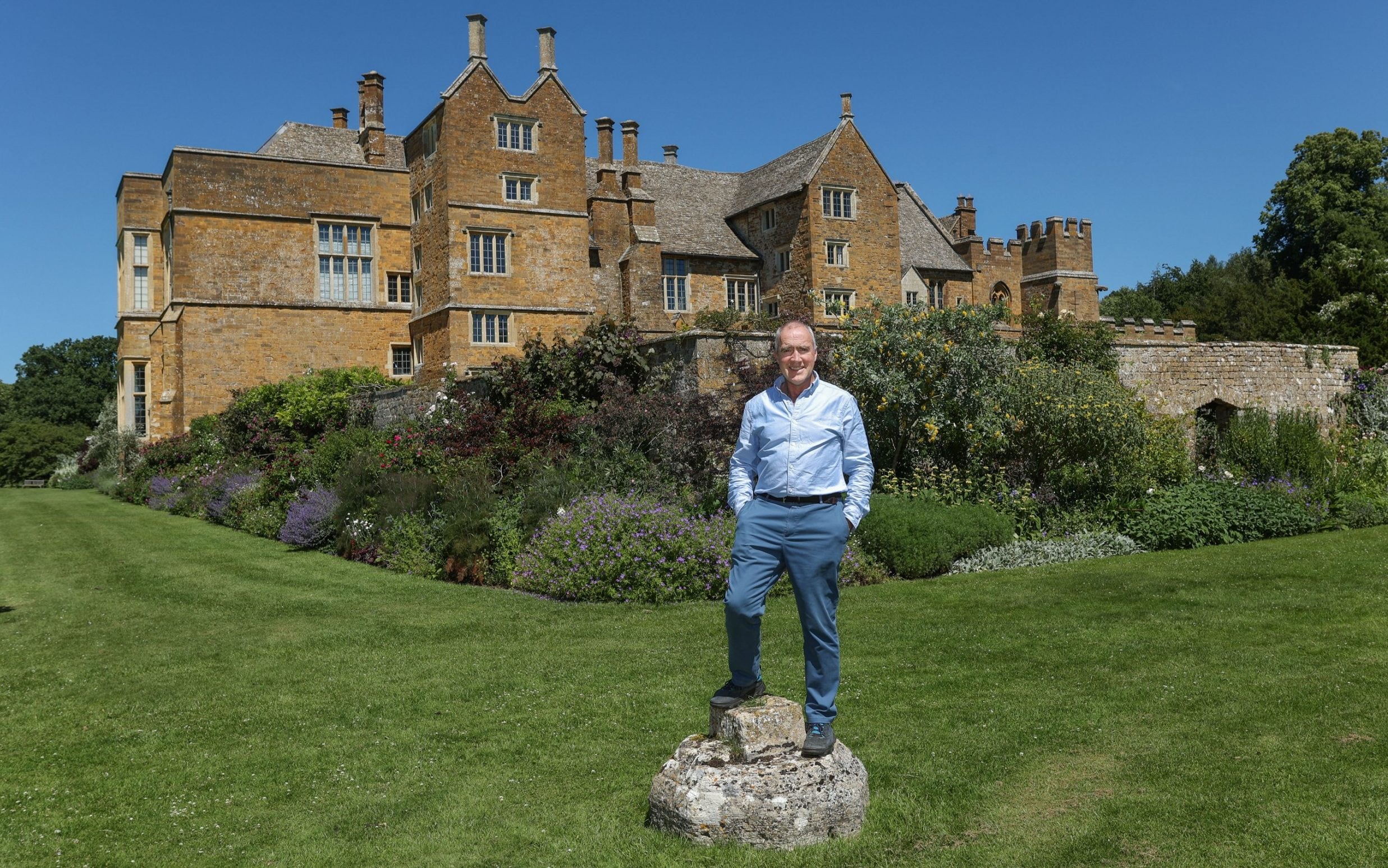 Martin Fiennes, 22nd Baron Saye and Sele, photographed at his home Broughton Castle near Banbury in Oxfordshire