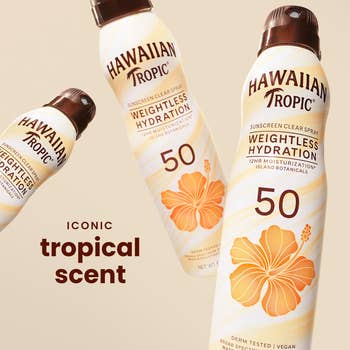 Three cans of Hawaiian Tropic weightless hydration sunscreen spray SPF 50, highlighting its iconic tropical scent