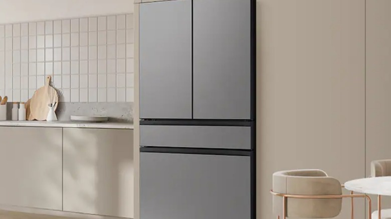 A sleek stainless steel refrigerator in a modern kitchen