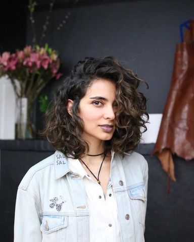 Natural Curls with Deep Side Part